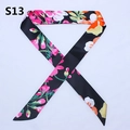 Detailed macro view of long black floral twilly scarf with vibrant pink flower patterns - Black Full Floral Print (PDS-13)