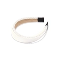 Detailed view of white satin headband with faux pearl inlay and soft brown inner lining - White