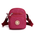 Waterproof burgundy nylon crossbody bag with three zipper compartments and shoulder strap - Rose Red