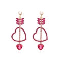 Elegant gold drop earrings featuring pink crystal arrow and red heart gemstone pendants - Rose Red