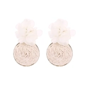 Detailed shot of handmade woven raffia floral earrings with elegant white resin petals - White