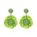 Detailed view of handmade lime green chiffon flower earrings with raffia woven centers - Green
