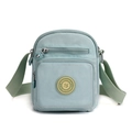 Light blue nylon crossbody bag with adjustable strap and front zipper pocket - Aqua