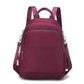 Mochila granate para mujer en tela Oxford con nailon impermeable y detalles dorados - Morado