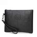 Detail of black leather clutch bag showing pebbled texture and silver zipper with wrist strap - Plain Style 2 / Black (Plain)