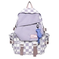 Purple checkerboard backpack with fashion label and cute blue bear keychain charm - Purple