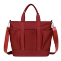 Donkerrode nylon draagtas met multi-pocket design en verstelbare schouderriem - Rood