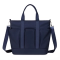Waterdichte marineblauwe nylon draagtas met voorzakken en verstelbare schouderriem - Blauw