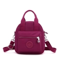 Magenta nylon crossbody phone bag with adjustable shoulder strap and zip pocket - Burgundy