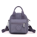 Lavender purple nylon mini backpack with adjustable straps and front zipper pocket - Light Purple