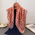 Orange paisley silk scarf with vintage cashew print displayed on a wooden hanger - Orange (FG87-4)