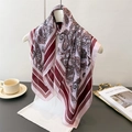 Detail of silk-like paisley square scarf styled on a white hanger with luxury accessories - One Size (66-70cm) / Red (FG88-2)