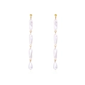 Elegant gold baroque long tassel earrings featuring glossy white pearls and dangle design - Long Baroque Pearl Tassel / White