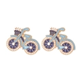 Cute gold-plated bicycle earrings with blue enamel and faux pearls on white background - Blue