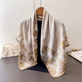 Silky square scarf with vintage floral daisy print styled over a dark top and hanger - 90cmx90cm / Tan