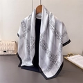 Elegant black and white floral faux silk scarf hanging on a wooden hanger with silk texture - White Base Black Floral Rhombus / White (FM308-1)