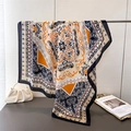 Vintage paisley print faux silk square scarf draped on a stand with elegant accessories - 90cm*90cm / Navy Blue