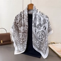 Close-up of paisley print satin scarf draped on a hanger with elegant silk texture - Large Square / White