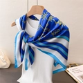 Elegant blue and white silk scarf with golden chain pattern tied over white top - 90*90cm / Blue