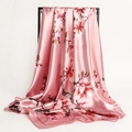 Pink satin square silk scarf with floral pattern hanging on a minimalist black metal frame - Cherry Pink Magnolia (FT227-4L)