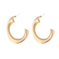 Golden chunky twisted C-shaped hoop earrings in a minimalist sculptural geometric style - Gold