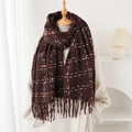 Detail of dark brown plaid cashmere scarf with soft fringe and classic check pattern - Brown