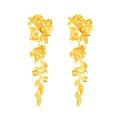 Retro golden long dangle earrings featuring embossed alloy leaves and layered flower design - Gold