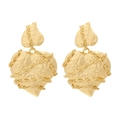 Luxury gold heart earrings with hammered metal texture and chain details on white background - Gold