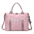 Large pale pink travel duffel bag with durable woven handles and detachable shoulder strap - Sakura Pink
