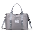 Gray nylon travel duffel bag with wet dry separation and adjustable shoulder straps - Gray