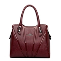 Burgundy faux leather handbag with lychee texture and glossy lacquer accents - Burgundy