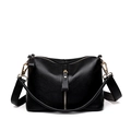 Minimalist black pebbled leather crossbody bag with gold hardware and vertical zippers - Black
