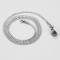 Dettaglio di una collana a catena piatta in argento con chiusura a moschettone - 1.1mm*45cm / Color Acciaio