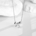 Silver bowknot pendant necklace in titanium steel with shimmering cubic zirconia accents - Ribbon Bow Style-Steel (N0060S)