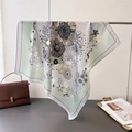 Detail view of the floral print silk scarf showing soft drapes and hand-drawn patterns - Green (FG39-1)