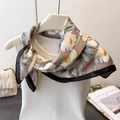 Floral print silk scarf styled on a mannequin with olive green and pink accents - Black Edge (FG41-2)