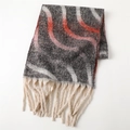 Close-up of rainbow zigzag knit pattern and long off-white tassels on warm scarf - 220*42cm / Red & Black