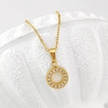 Collana dorata con pendente circolare in madreperla e zirconi incastonati a mano - Stile Rotondo (N0042)