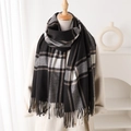 Detail of classic black and white plaid scarf with fringe tassels and soft cashmere feel - Black