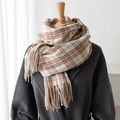 Detail of tartan scarf showing thick autumn texture and long tassels on coat - Orange Brown