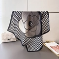 Detail of vintage herringbone scarf with large camellia print and soft texture - Black