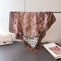 Close-up of vintage paisley flower silk scarf draped elegantly with a chain handbag - 68*68cm / Brown