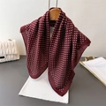 Vintage burgundy polka dot scarf on a wooden hanger with a stylish white handbag - Burgundy