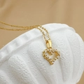 Elegante goldene Herzanhänger-Halskette mit funkelndem Zirkonia-Mikropavé-Besatz - Klassischer Hohles Herz-Stil (N0082)