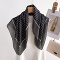 Elegant black and white polka dot silk-feel scarf draped on a minimalist white dress - French Style Black Polka Dot (FG16-2黑色)