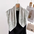 Elegant paisley print silk-like scarf in cream white hanging on a wooden hanger - 70*70cm / FG15-1 Cream Paisley