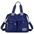 Grande borsa a mano in nylon blu navy con design multitasche e tracolla regolabile - Blu