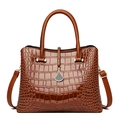 Classic dark brown crocodile pattern handbag with golden charms and adjustable shoulder strap - Brown