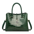 Detail of dark green crocodile texture leather handbag with gold hardware and pendant - Green