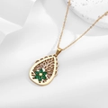 Gold teardrop necklace with green zircon flower and intricate hollow branch pattern - Teardrop Hollow Green Gem Flower (N0337G)